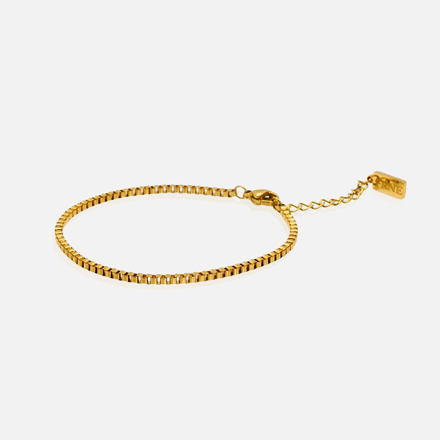 Sleek gold box chain bracelet with adjustable extension chain on a clean white background