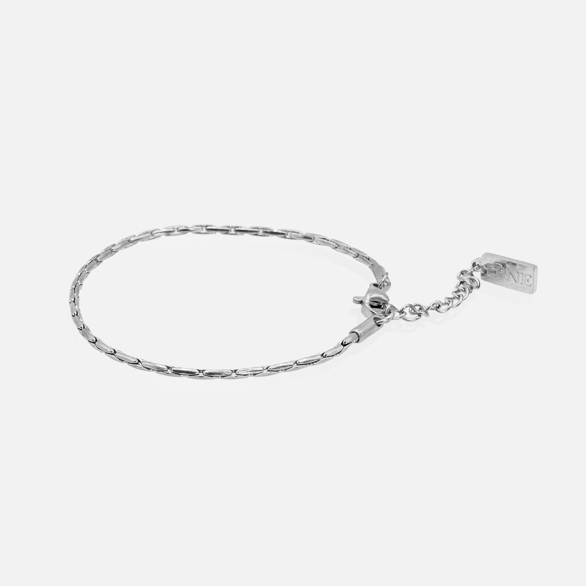 Silver round snake chain bracelet with extension chain on white background
