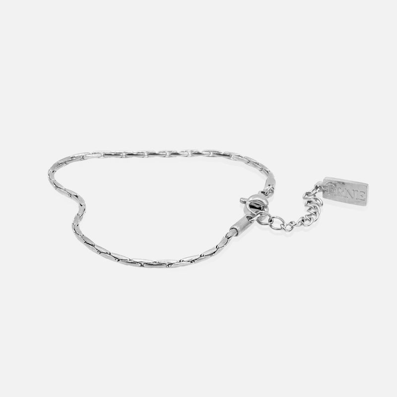 Silver snake chain bracelet with extension chain and clasp on white background