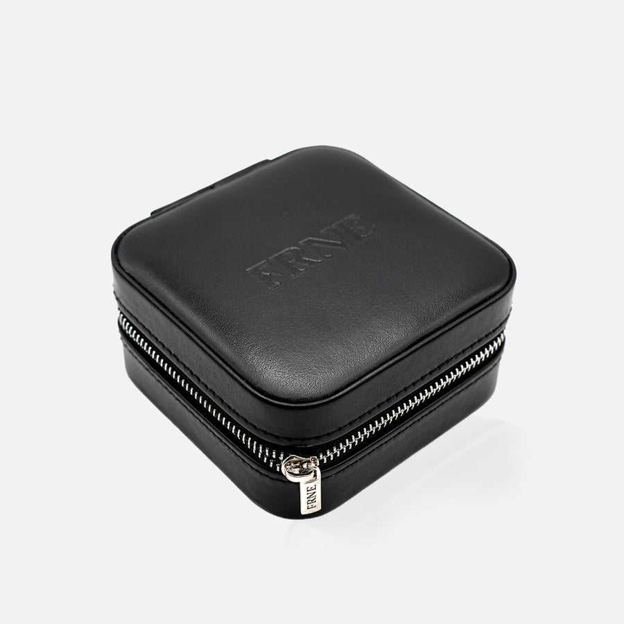 Black jewelLry case with 'FRNE' branding on a white background