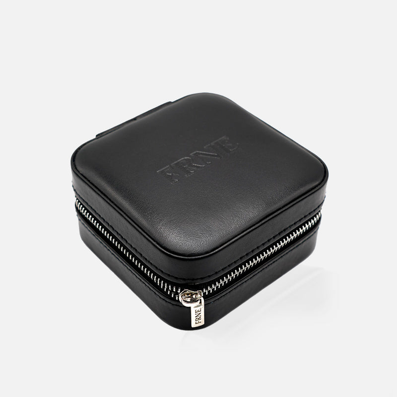 Black jewelLry case with 'FRNE' branding on a white background