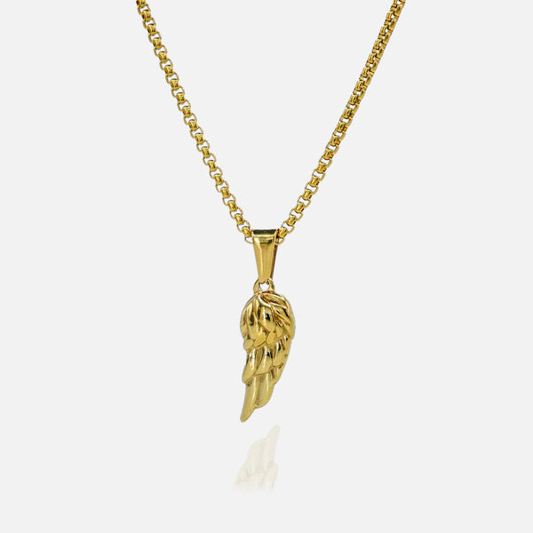 Gold necklace with a wing-shaped pendant on a white background