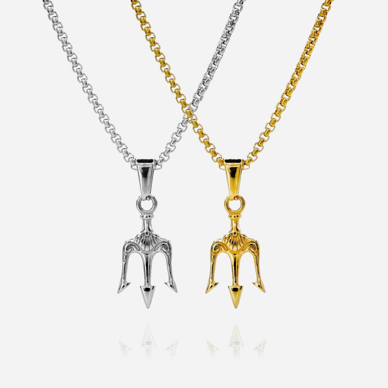 Two necklaces with unique pendants, one silver and one gold, on a white background.
