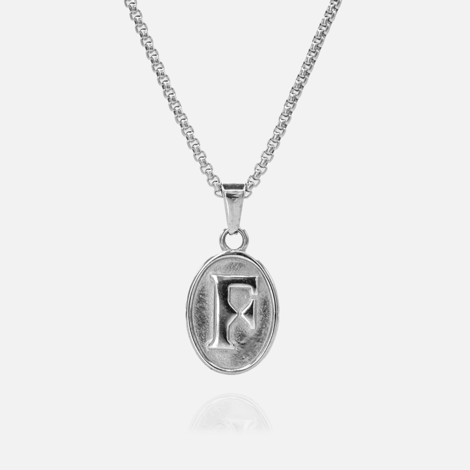 Silver necklace with a pendant on a white background