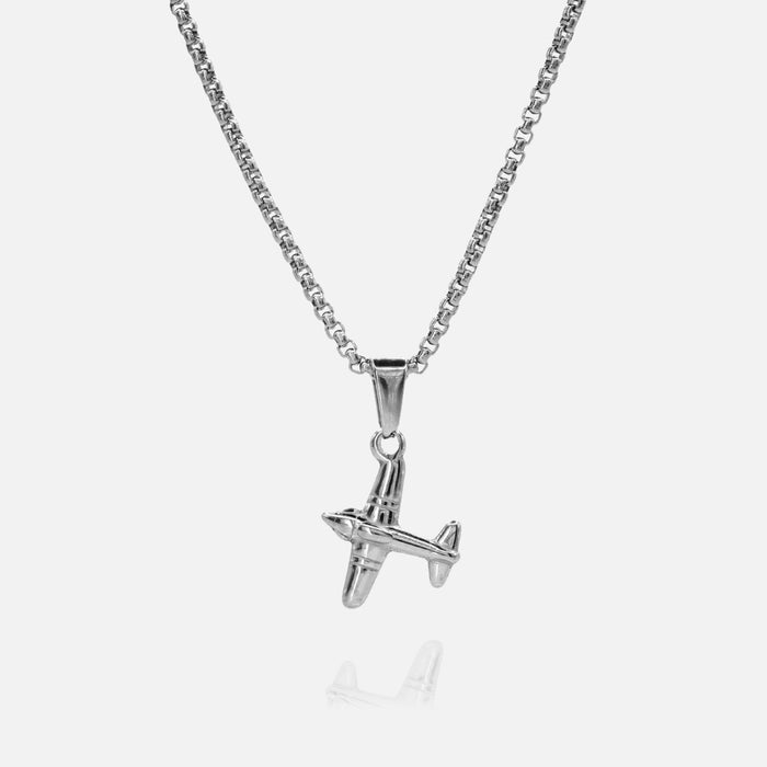 Silver airplane pendant on a chain against a white background
