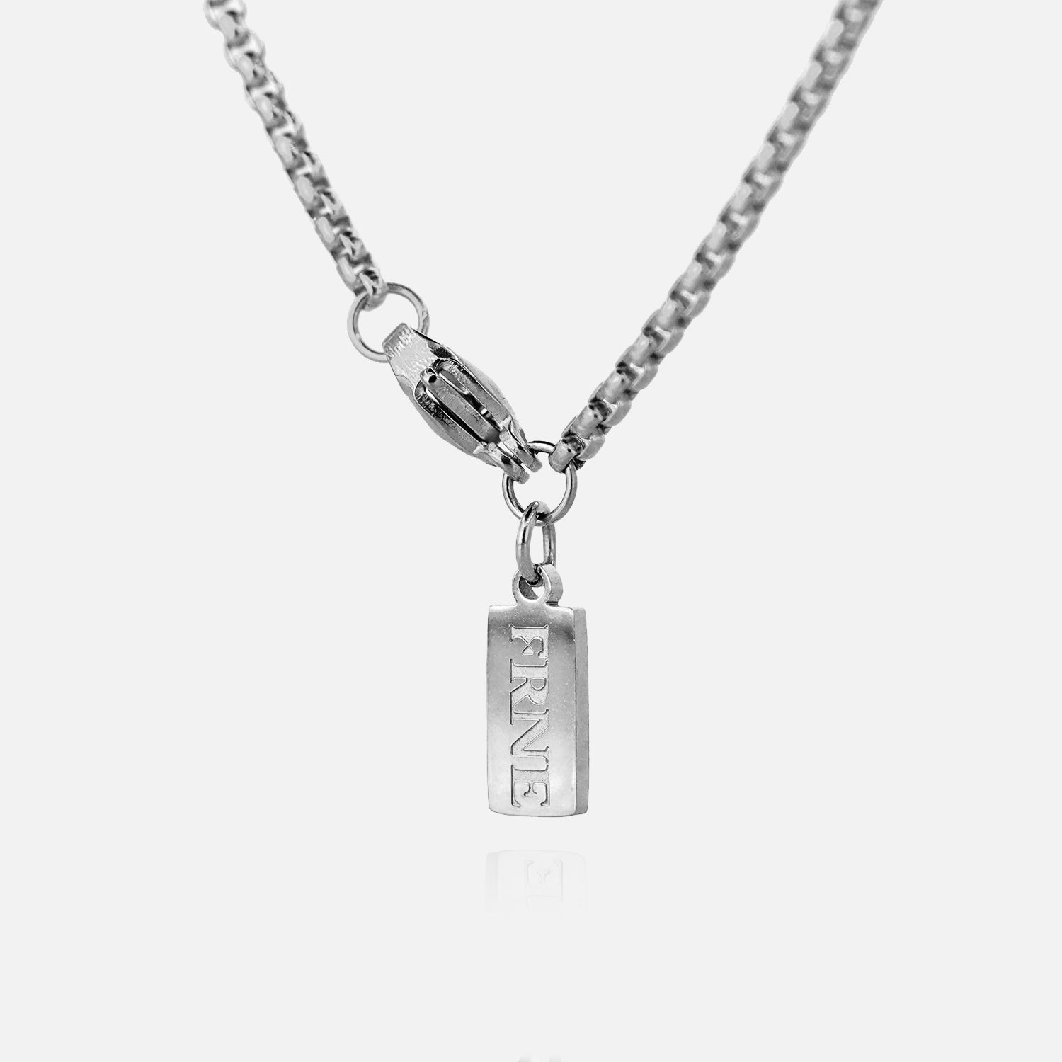 Silver necklace with a pendant on a white background
