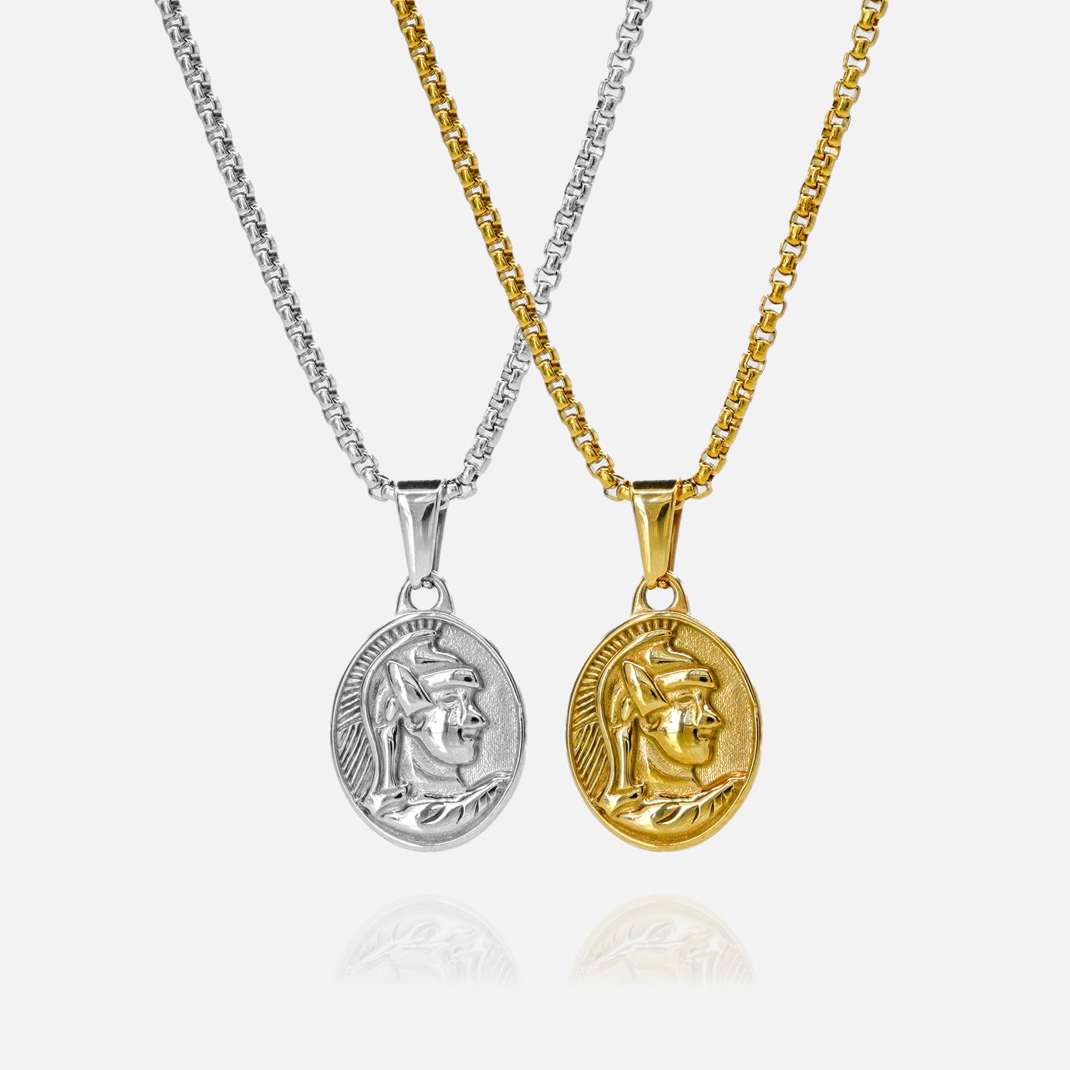 Two necklaces with circular pendants on a white background