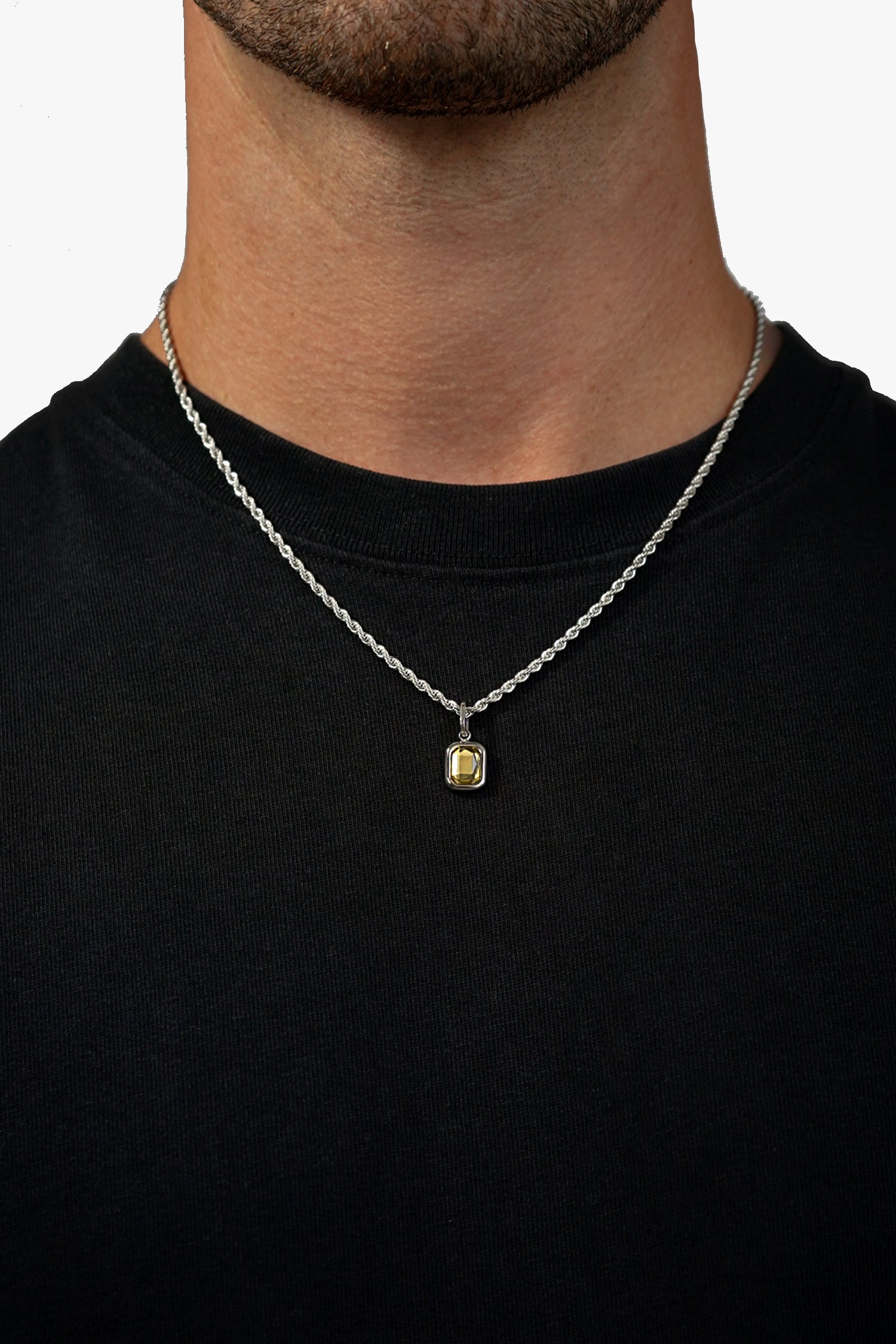 FRNE citrine gemstone sterling silver pendant necklace with yellow stone worn on neck with black shirt close up