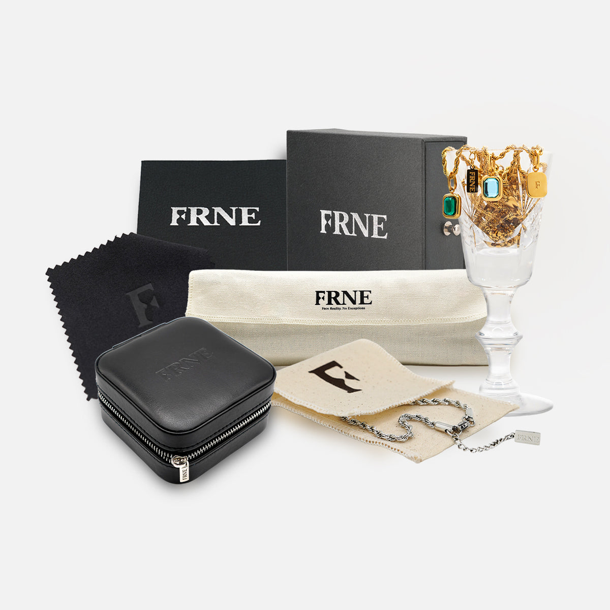 FRNE jewelry packaging gift set with necklace box pouch cleaning cloth and gold gemstone pendant necklaces on white background
