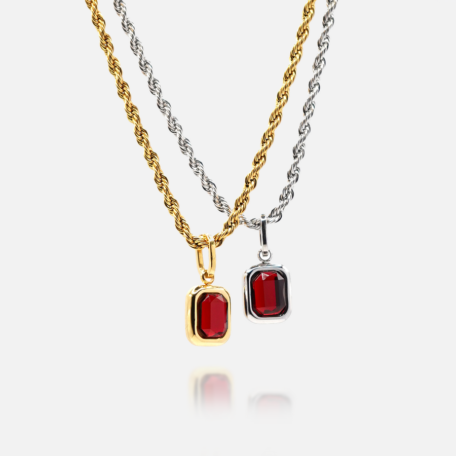 FRNE ruby flame red gemstone necklaces in gold and silver, featuring two rectangular deep red stone pendants on rope-style chains, displayed side by side on a white background to show metal colour options